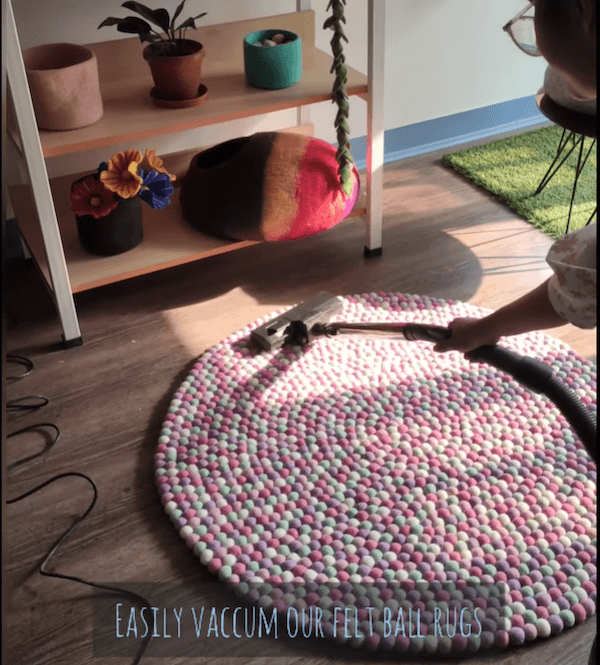 Felt ball rugs cleaning with vaccum cleaner